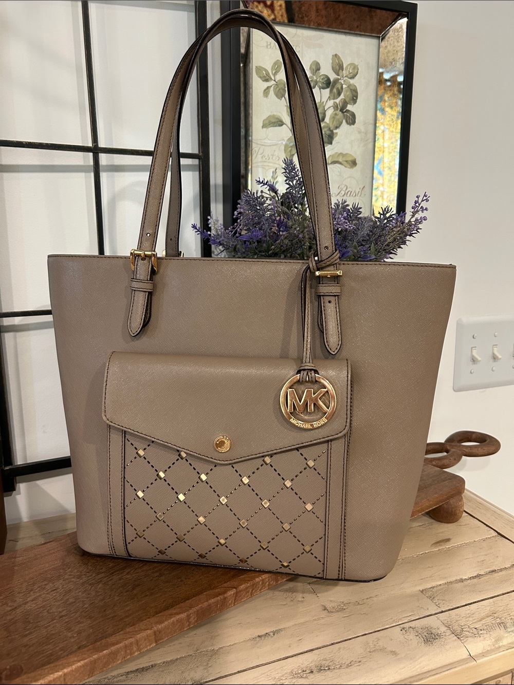 Michael Kors taupe leather tote with quilted front pocket and gold MK charm